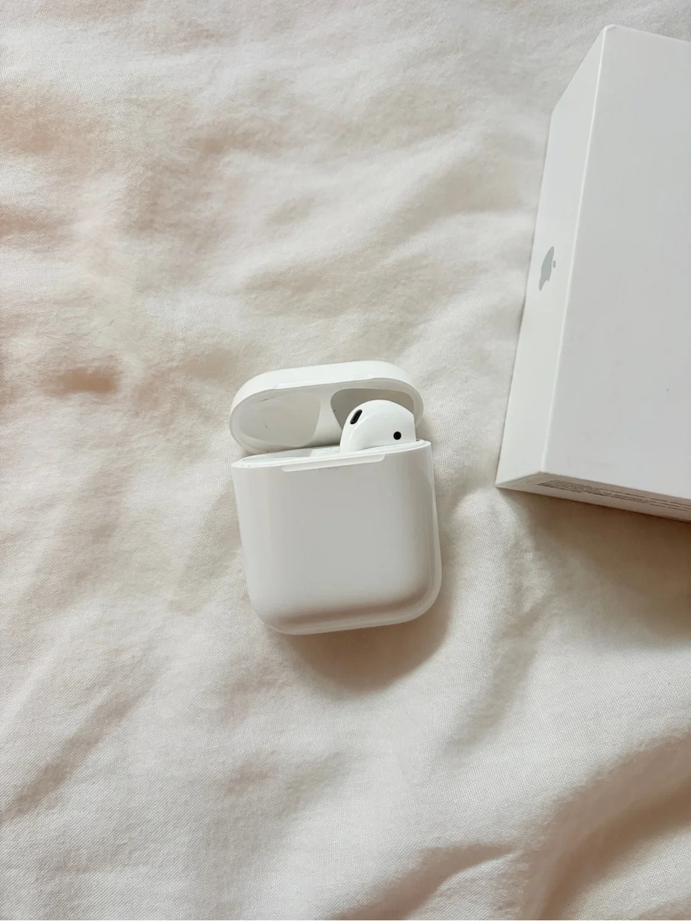 Apple AirPods with Charging Case - White